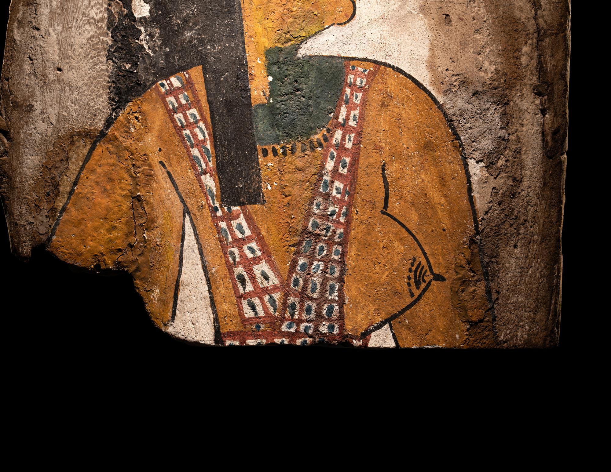 An Egyptian Polychrome Wood Fragment of a Sarcophagus with Isis