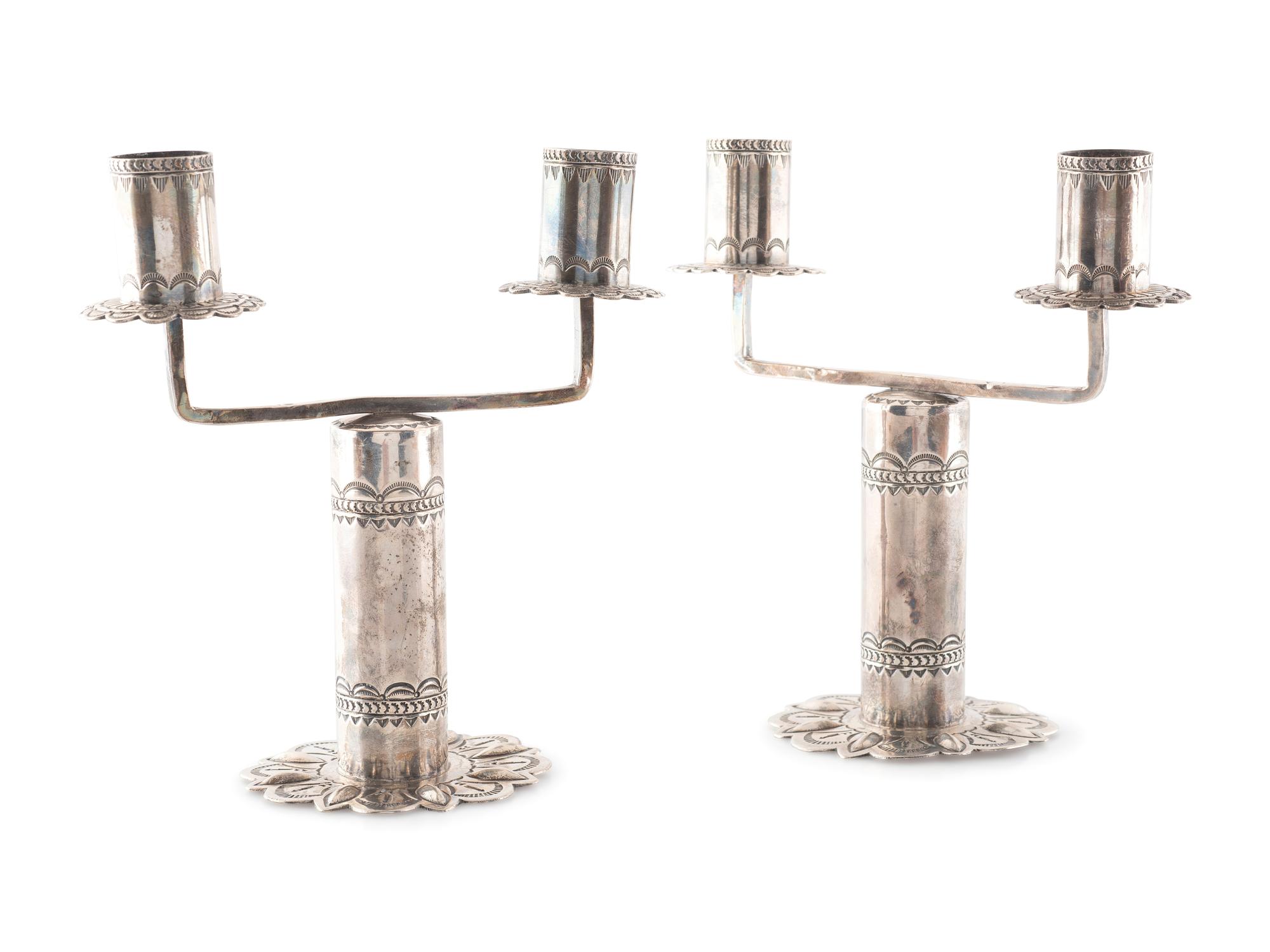 Pair of Heavily Stamped Silver Candelabras