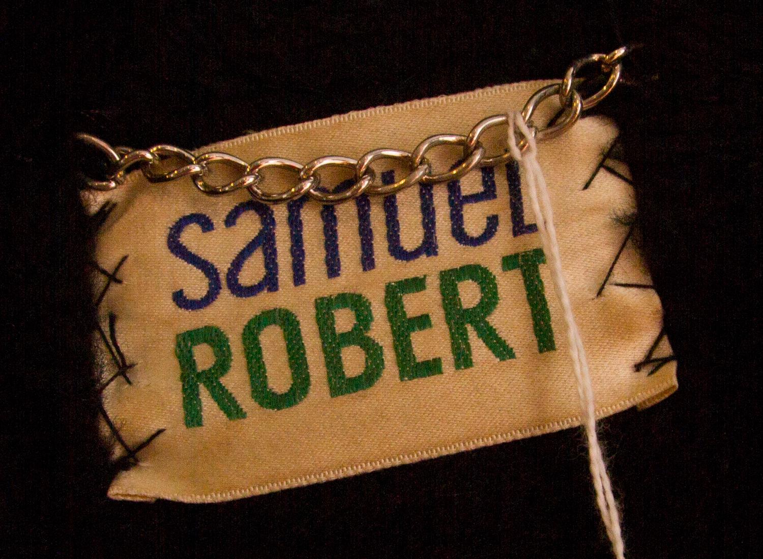A Samuel Robert Black Leather and Animal Print Coat,