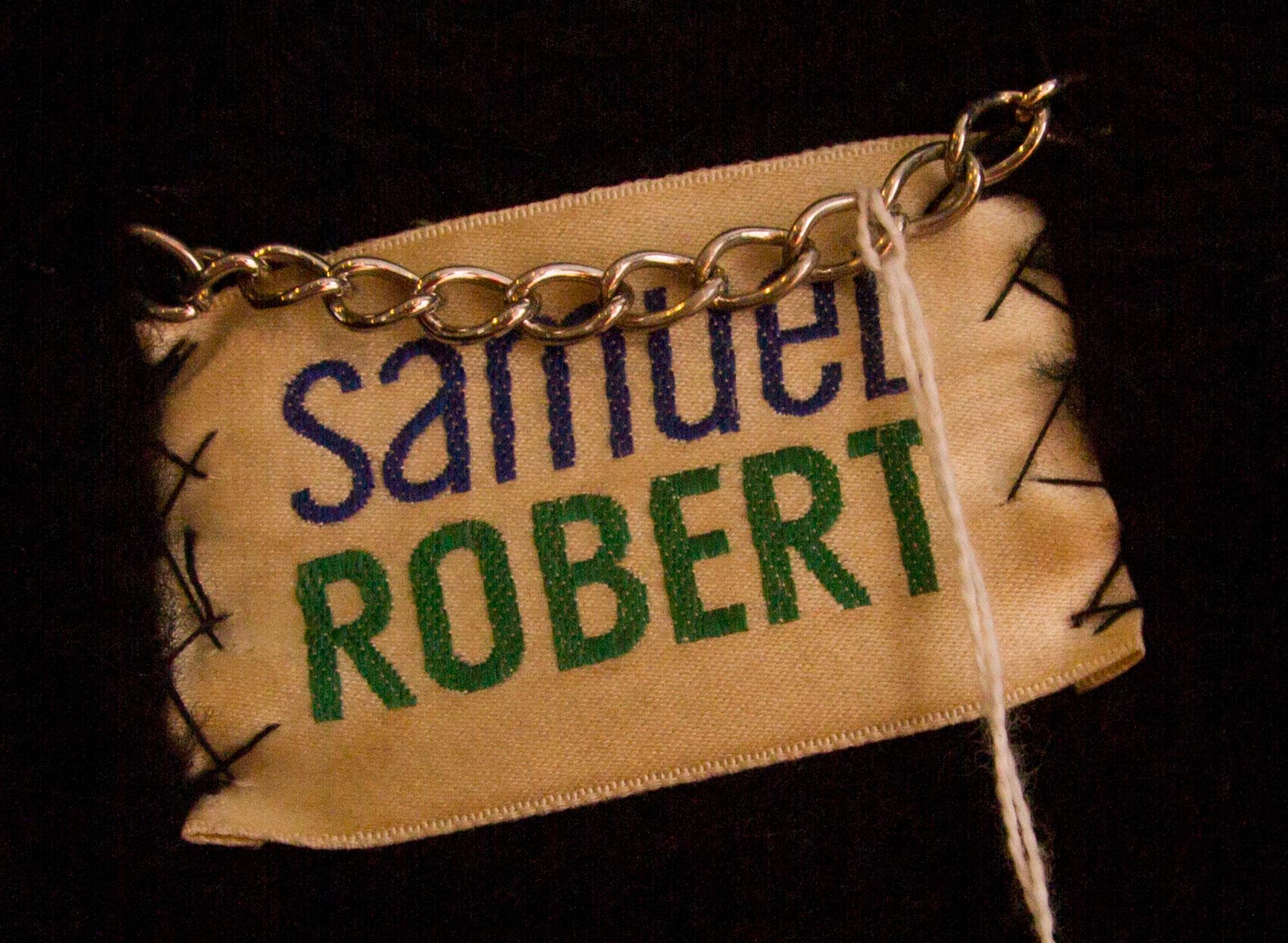 A Samuel Robert Black Leather and Animal Print Coat,
