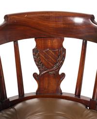 A Pair of English Mahogany and Leather-Upholstered Desk Chairs
