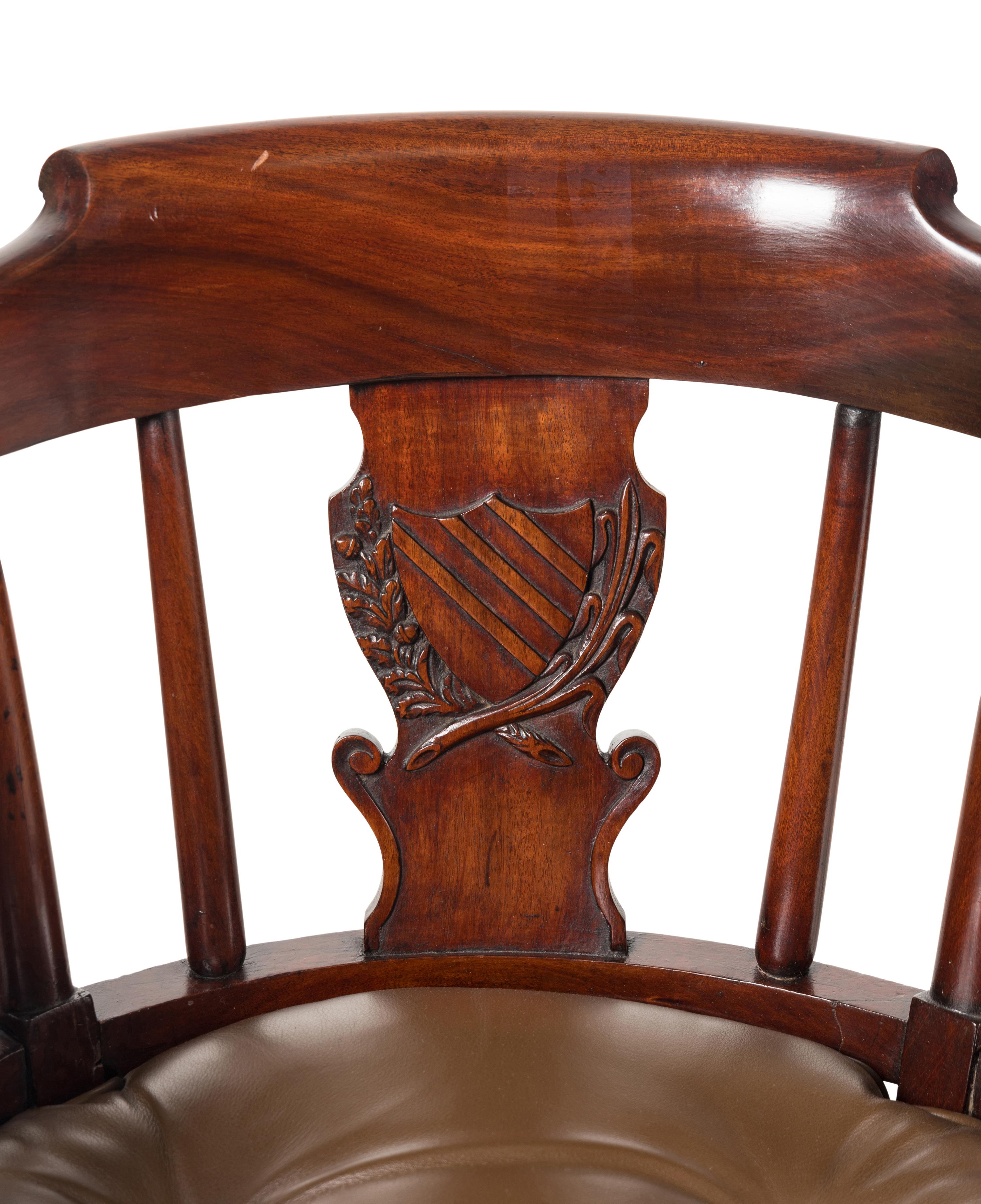 A Pair of English Mahogany and Leather-Upholstered Desk Chairs