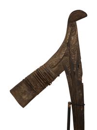 A Mughal Painted Wood Paddle and Two Oceanic Carved Wood Articles