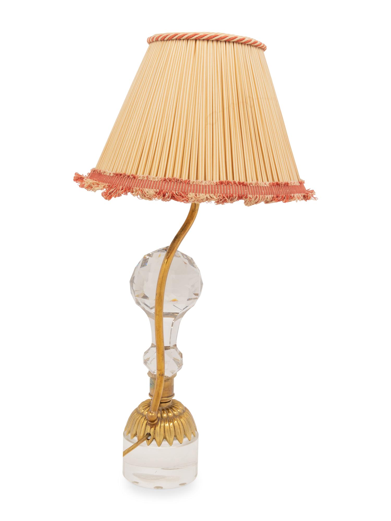APPROVED FOR DONATION A Gilt Metal Mounted Cut Glass Table Lamp with a Pleated Silk Shade