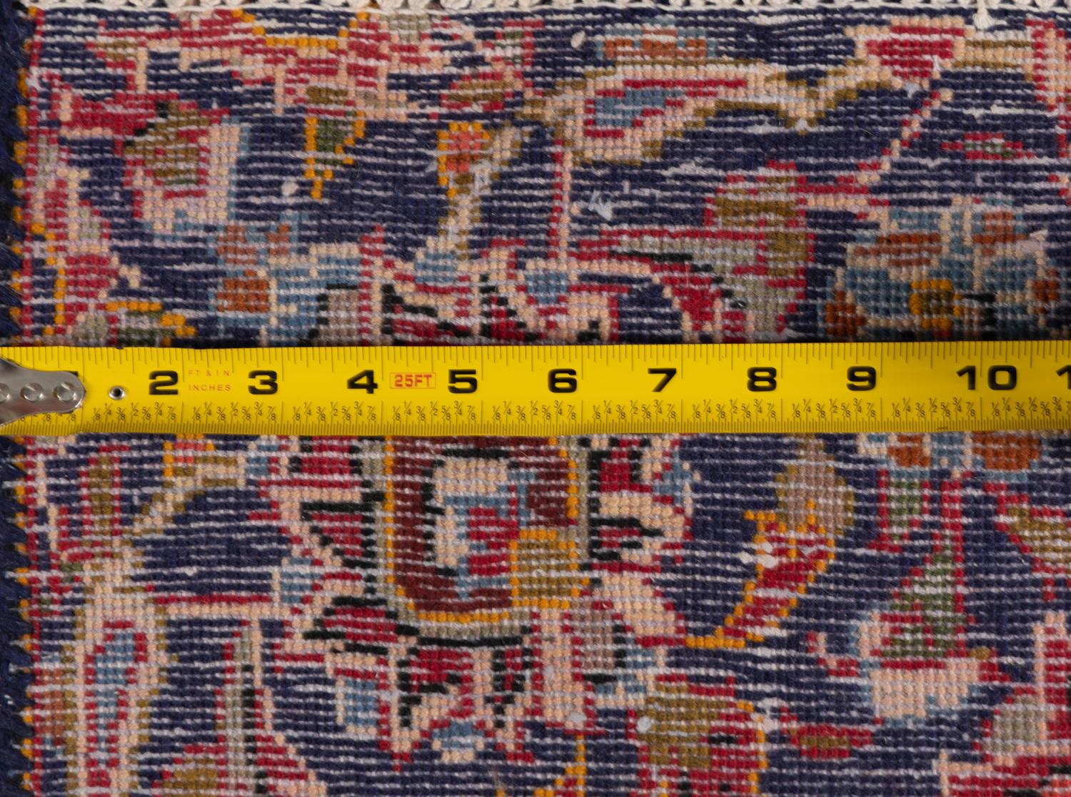 A Kashan Wool Rug