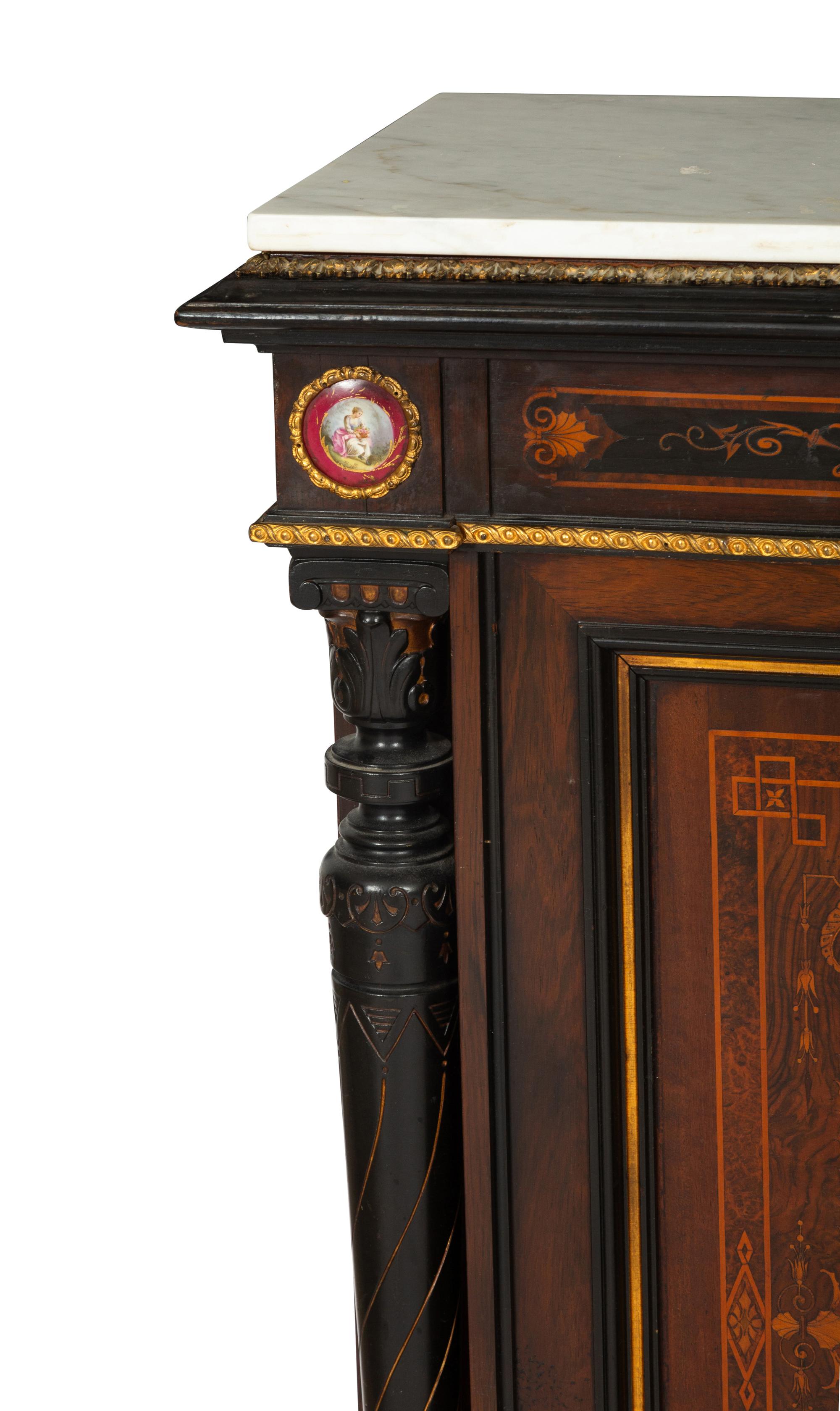 A Victorian Renaissance Revival Marquetry Inlaid and Parcel Ebonized Credenza in the Manner of Herter Brothers