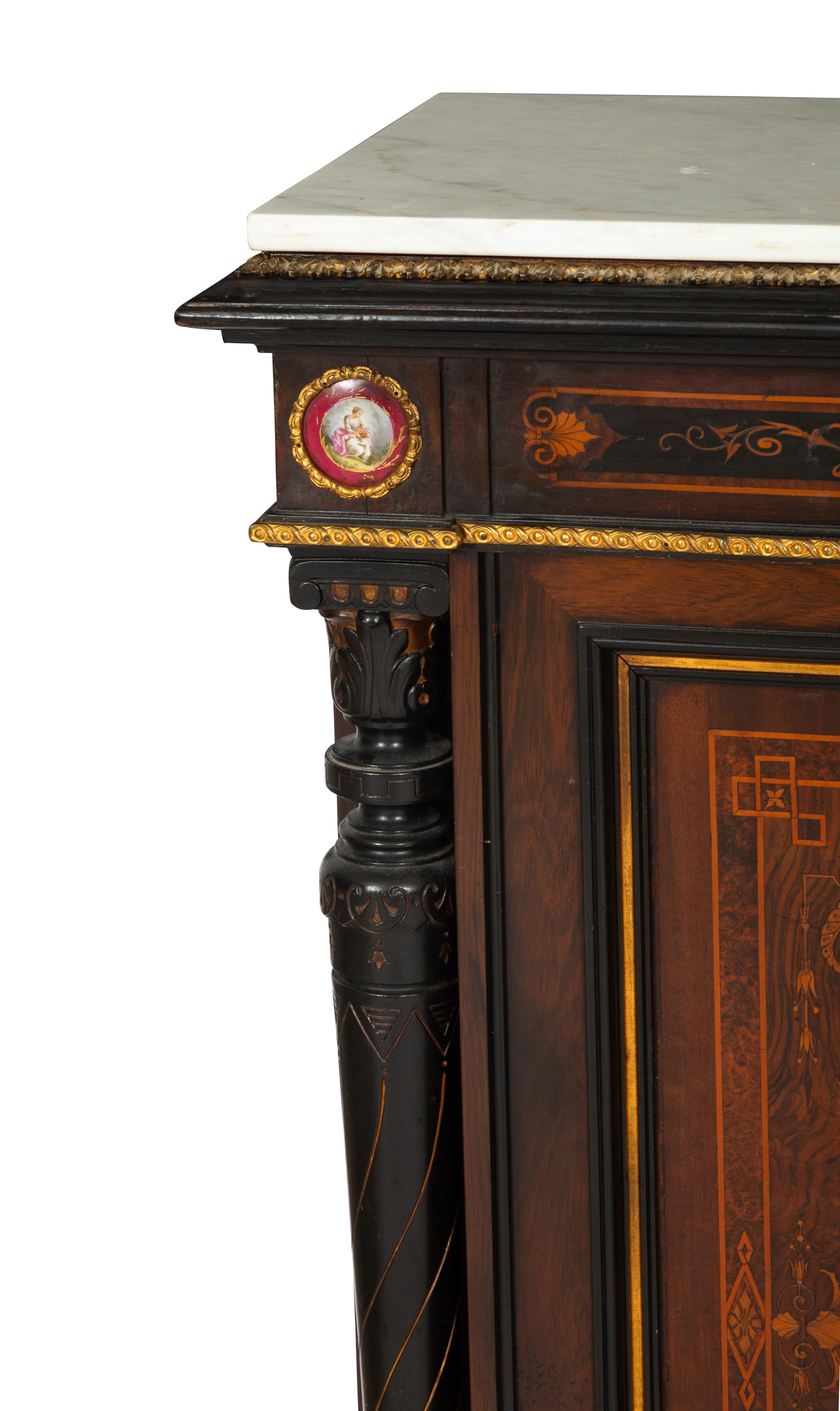 A Victorian Renaissance Revival Marquetry Inlaid and Parcel Ebonized Credenza in the Manner of Herter Brothers