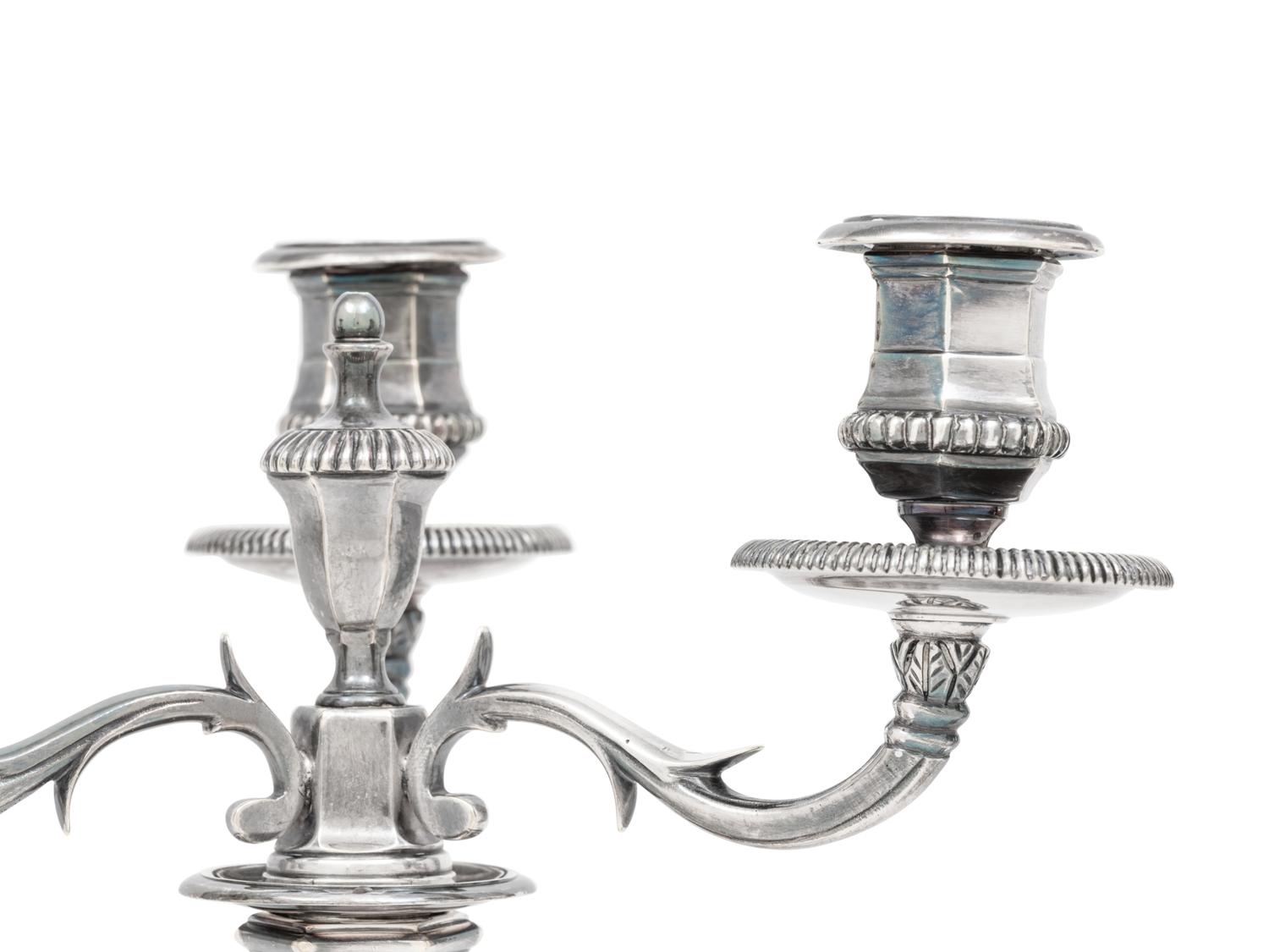 A Pair of George III Silver Candlesticks