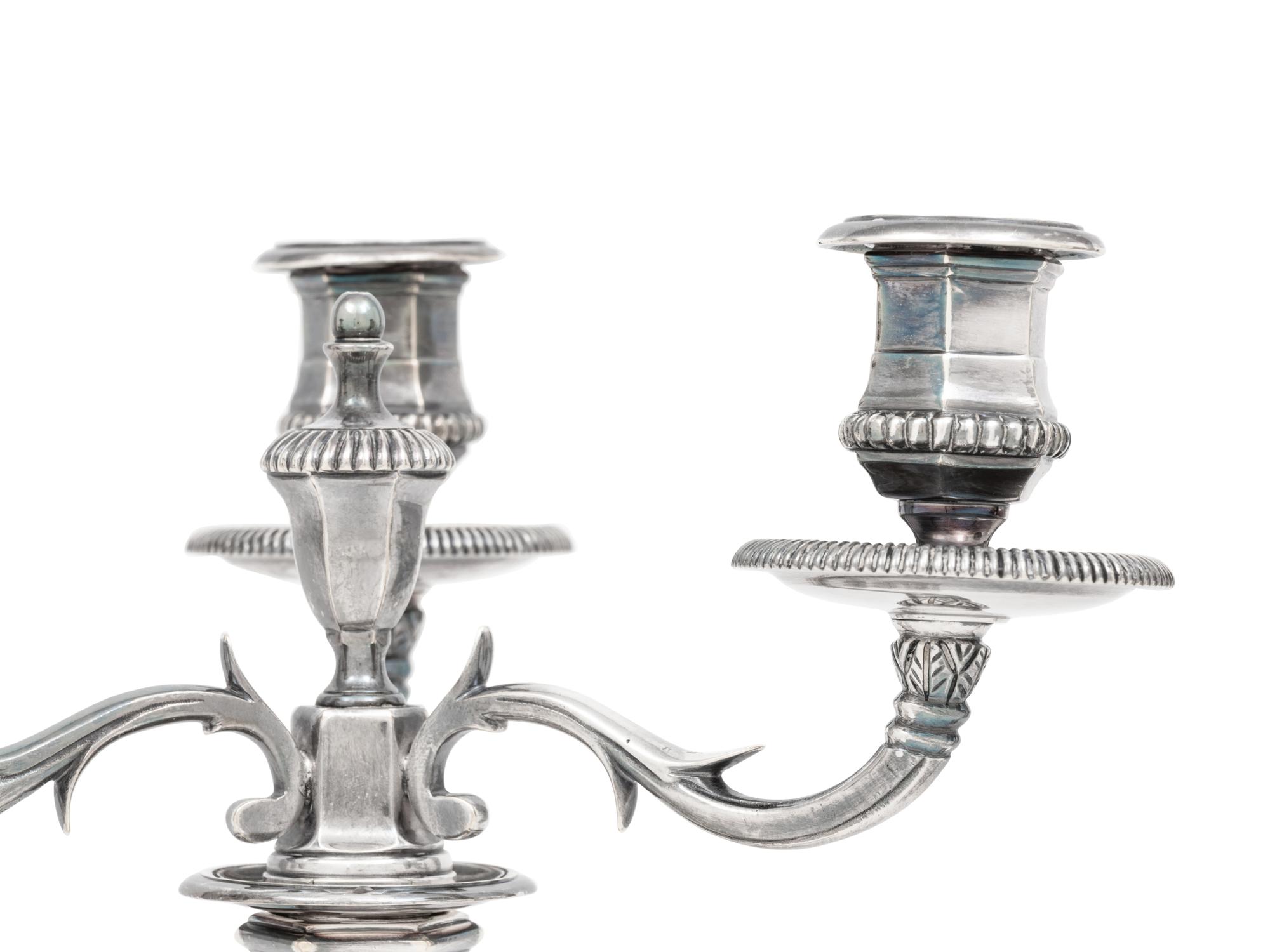 A Pair of George III Silver Candlesticks