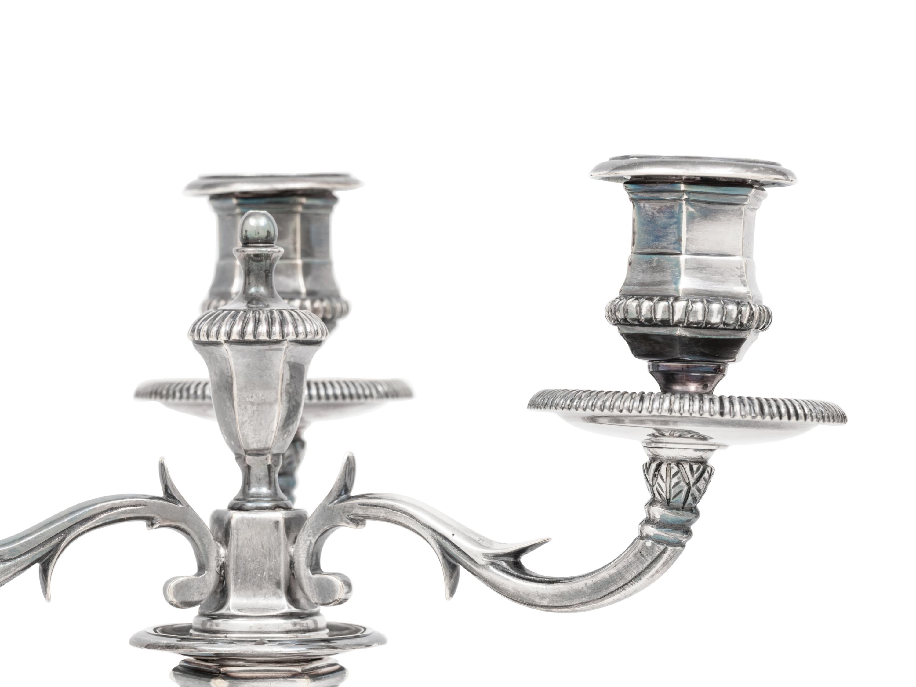 A Pair of George III Silver Candlesticks