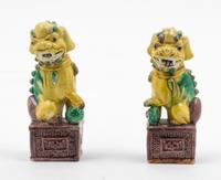A Pair of Sancai Glazed Porcelain Figures of Fu Lions Height of tallest 5 3/4 inches. — 19TH CENTURY