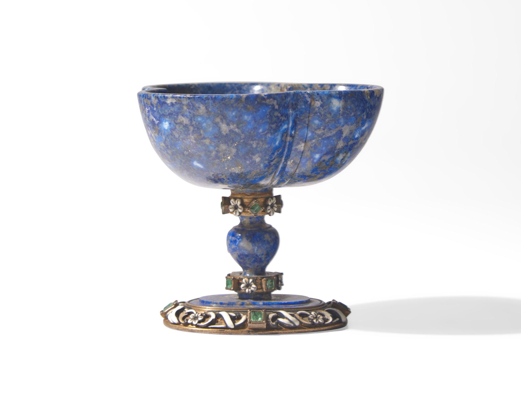 A Viennese carved lapis lazuli, emerald encrusted, and enamel-decorated silver gilt cup, Austria, late 19th century