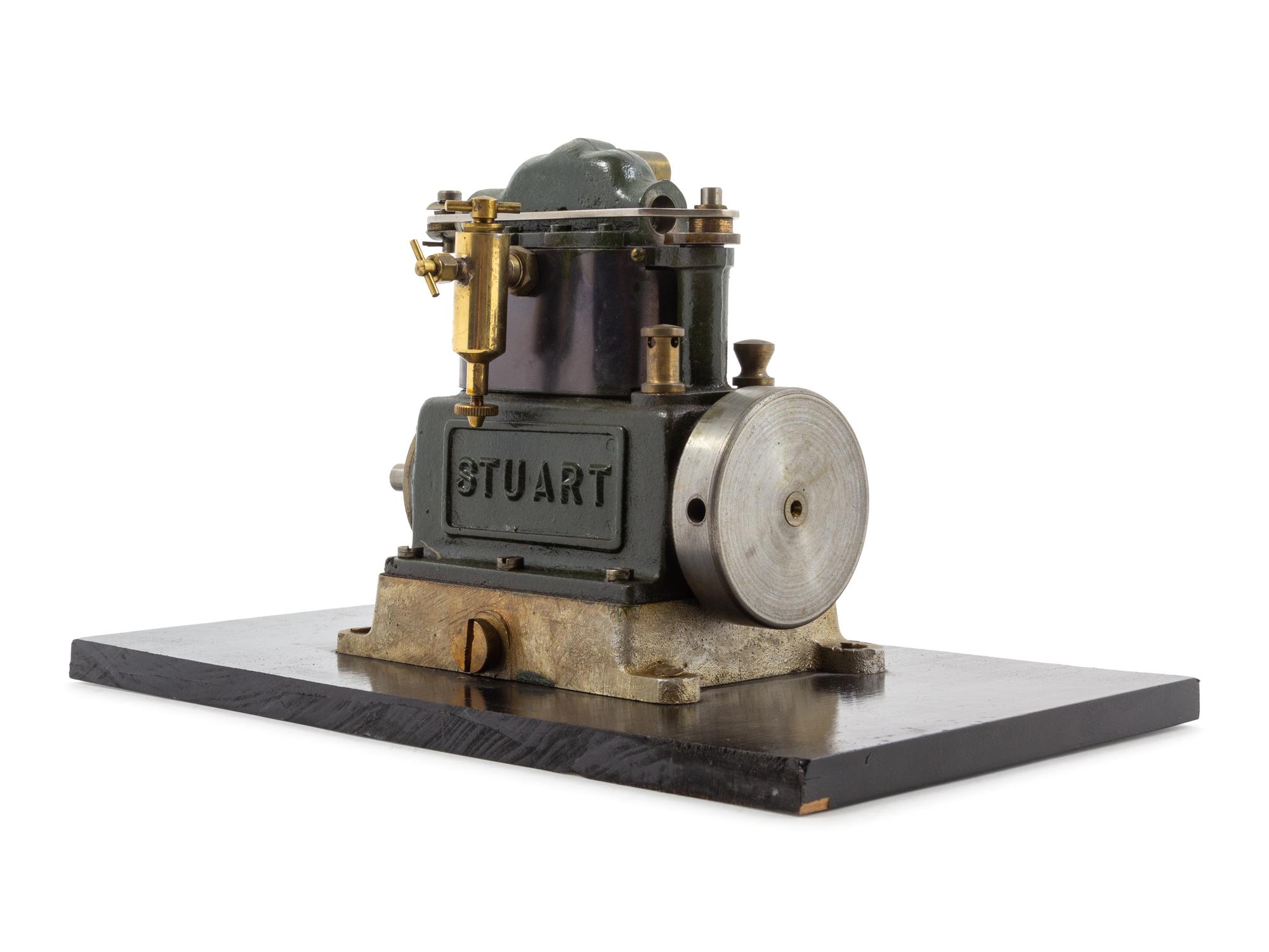 A Painted Metal Single-Strong Piston Engine and Flywheel Scale Model