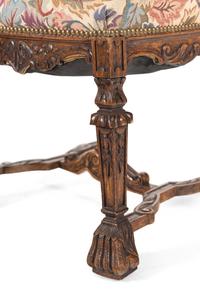 A Set of Eight Renaissance Style Carved Walnut Dining Chairs