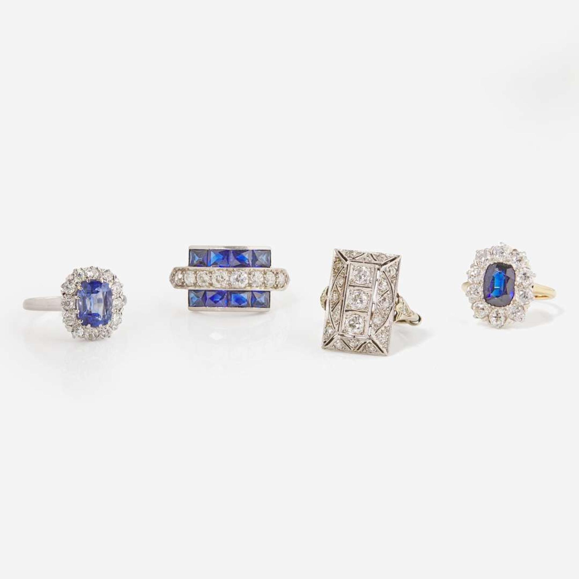 A Collection of Four Diamond and Sapphire Rings