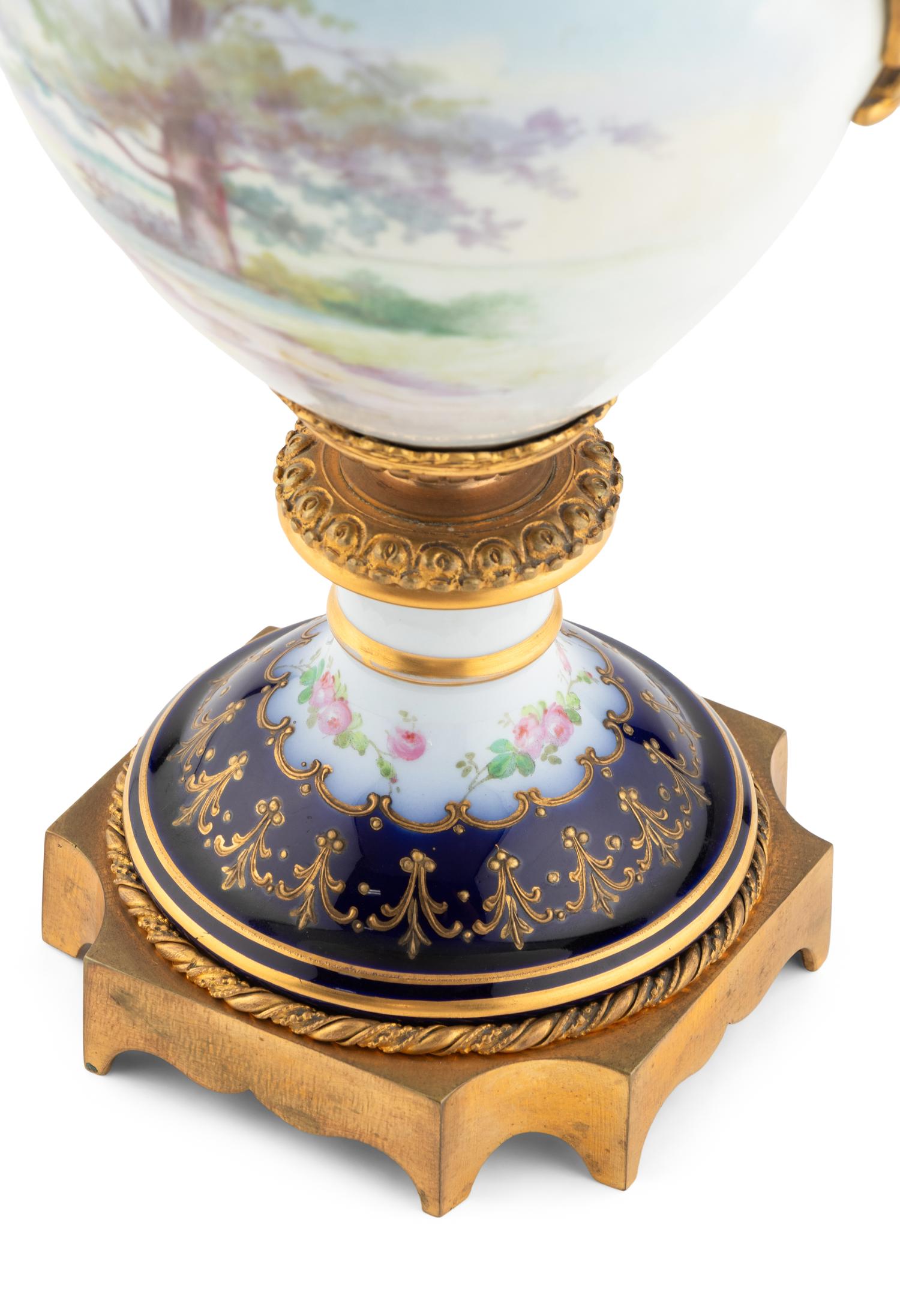 A Gilt Bronze Mounted Sèvres Style Porcelain Urn