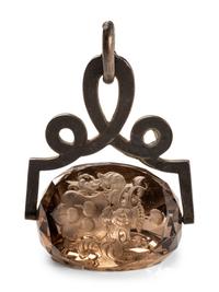 A German Carved Topaz and Gilt Metal Mounted Hand Seal