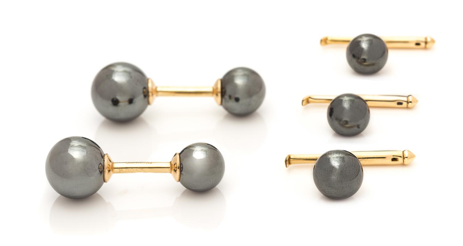 A Yellow Gold and Hematite Barbell Dress Set, Tiffany & Co., 11.80 dwts.