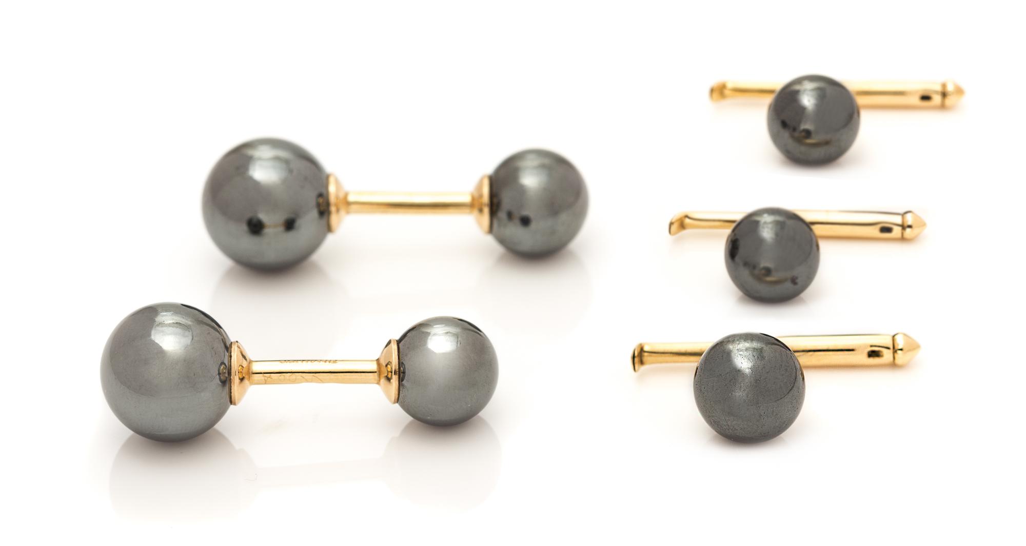 A Yellow Gold and Hematite Barbell Dress Set, Tiffany & Co., 11.80 dwts.