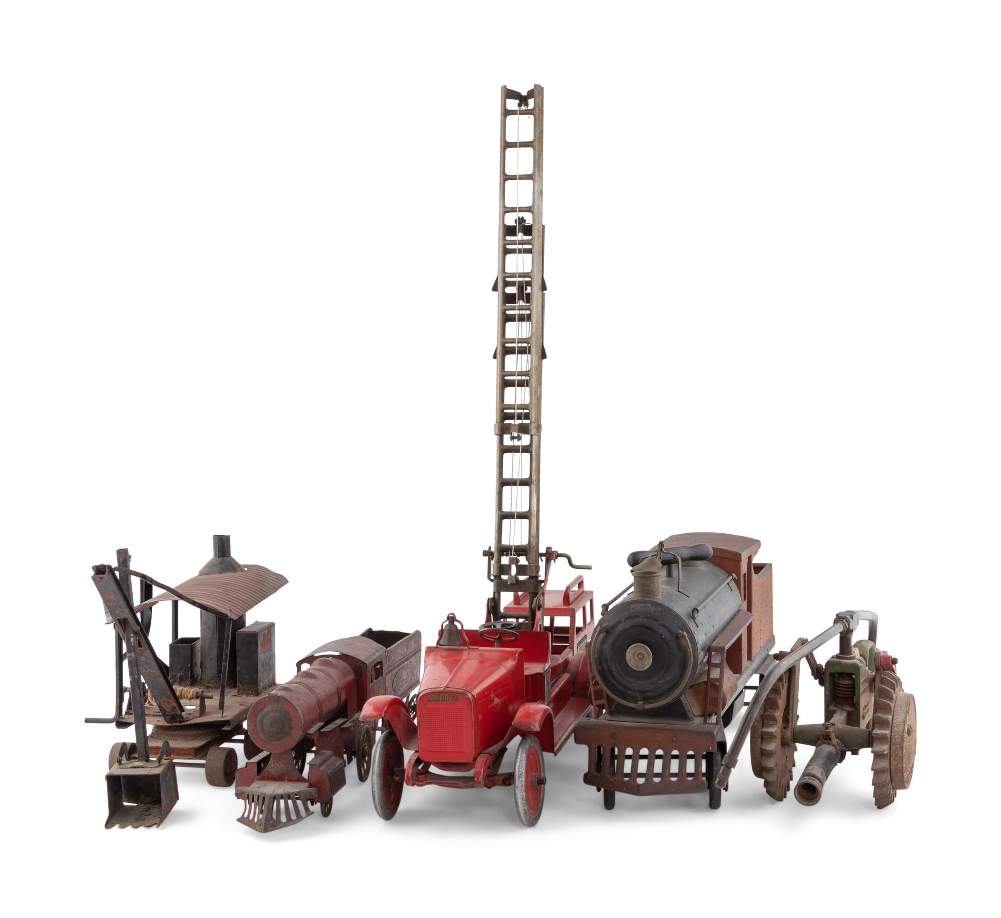 A Group of Five Metal Toys