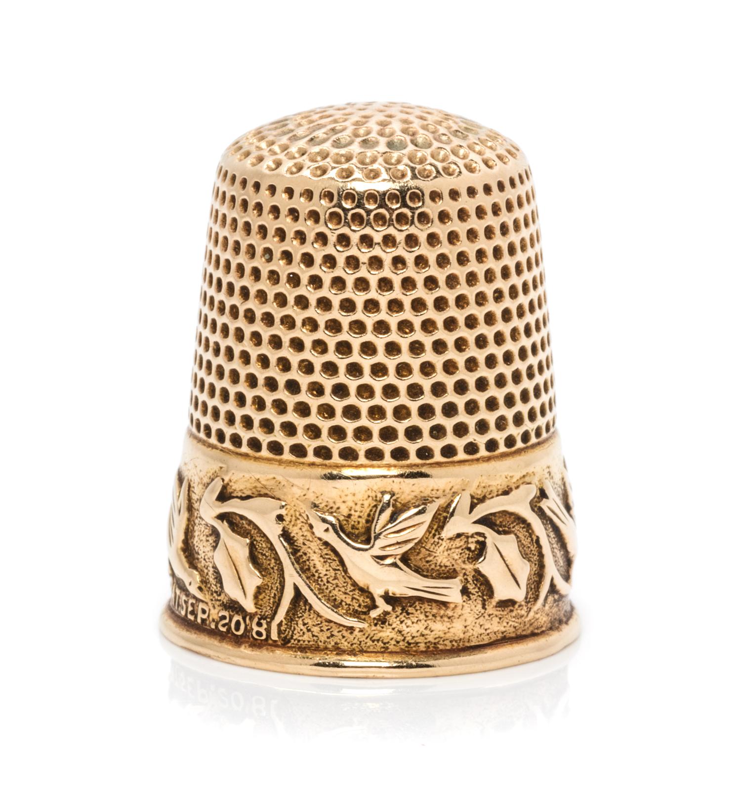 An American 14-Karat Yellow Gold Thimble, Ketcham & McDougall, New York, NY, 19th Century, the knurled top and body above a foliate, vi