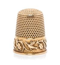 An American 14-Karat Yellow Gold Thimble, Ketcham & McDougall, New York, NY, 19th Century, the knurled top and body above a foliate, vi