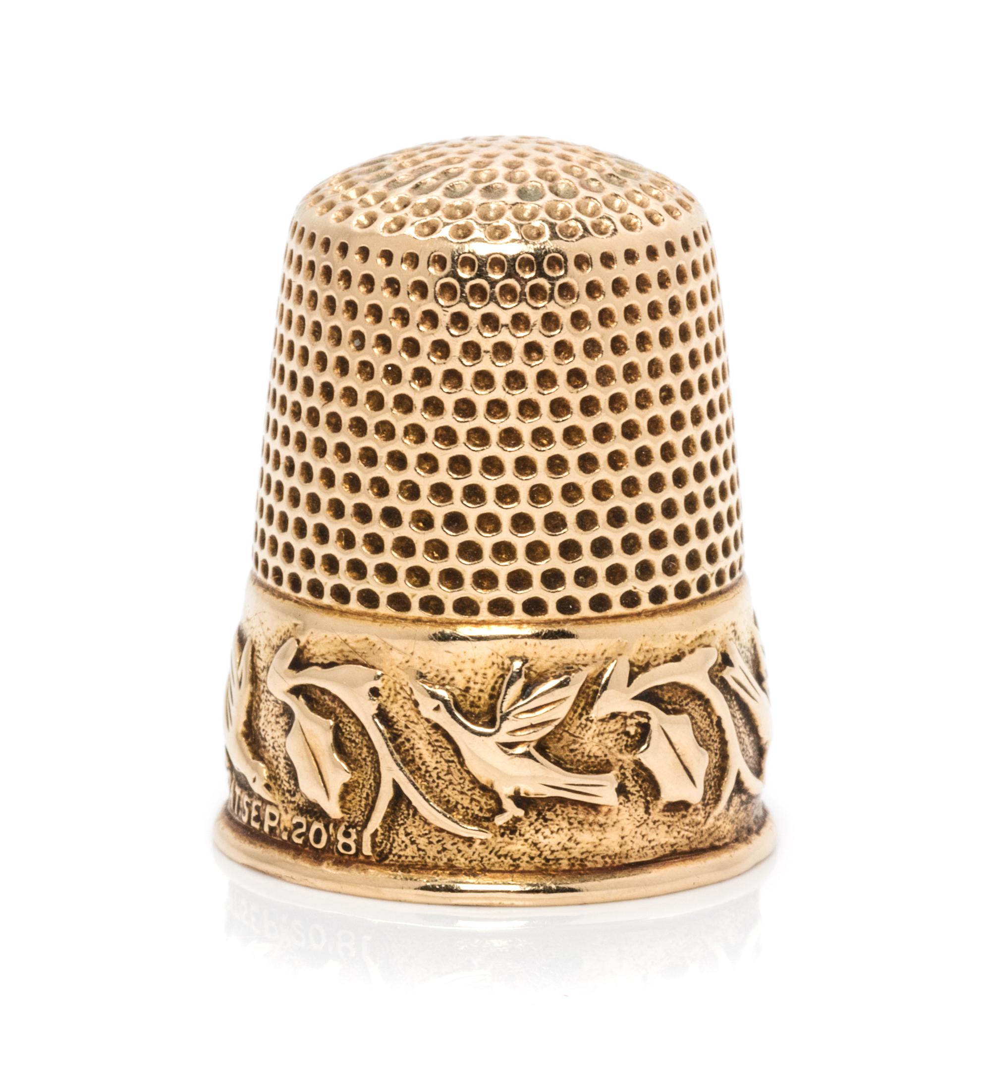 An American 14-Karat Yellow Gold Thimble, Ketcham & McDougall, New York, NY, 19th Century, the knurled top and body above a foliate, vi