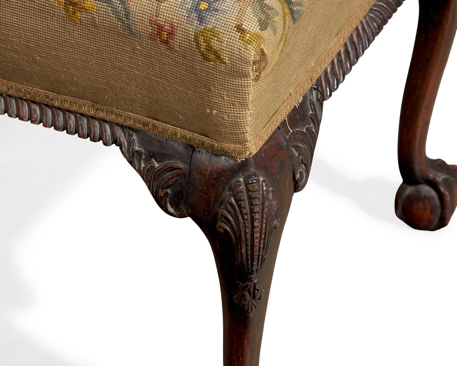 A George III Style Carved Mahogany Stool with Needlepoint Upholstery