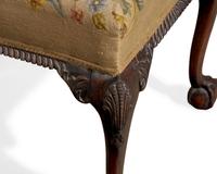A George III Style Carved Mahogany Stool with Needlepoint Upholstery
