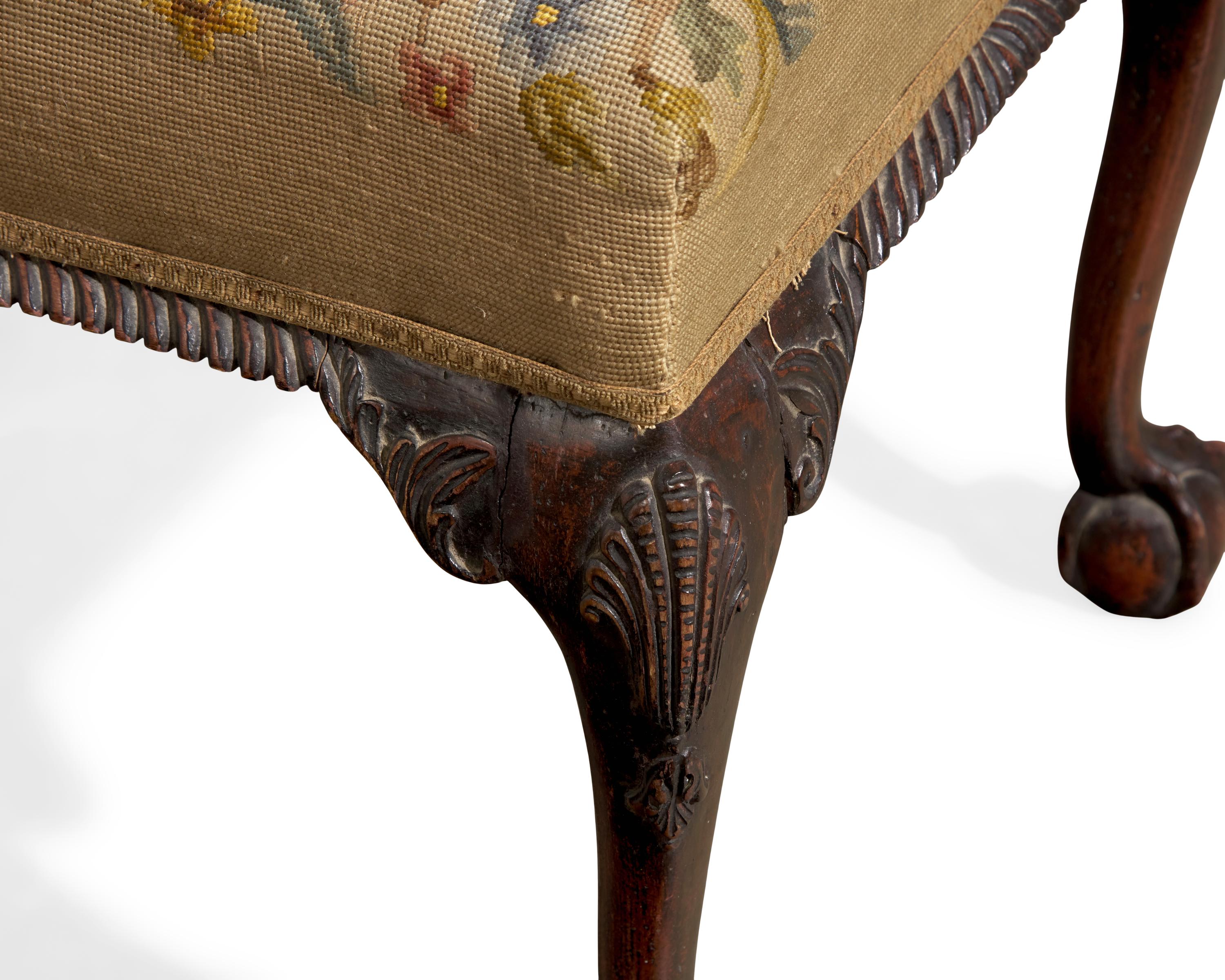 A George III Style Carved Mahogany Stool with Needlepoint Upholstery