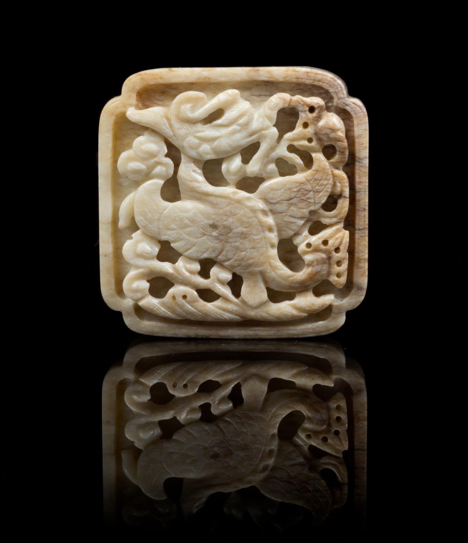 A Chicken Bone Jade Belt Slide Length 2 5/8 inches.