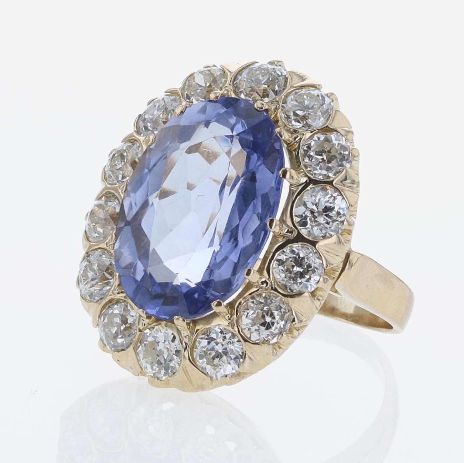 A Sapphire, Diamond, and 14K Yellow Gold Ring