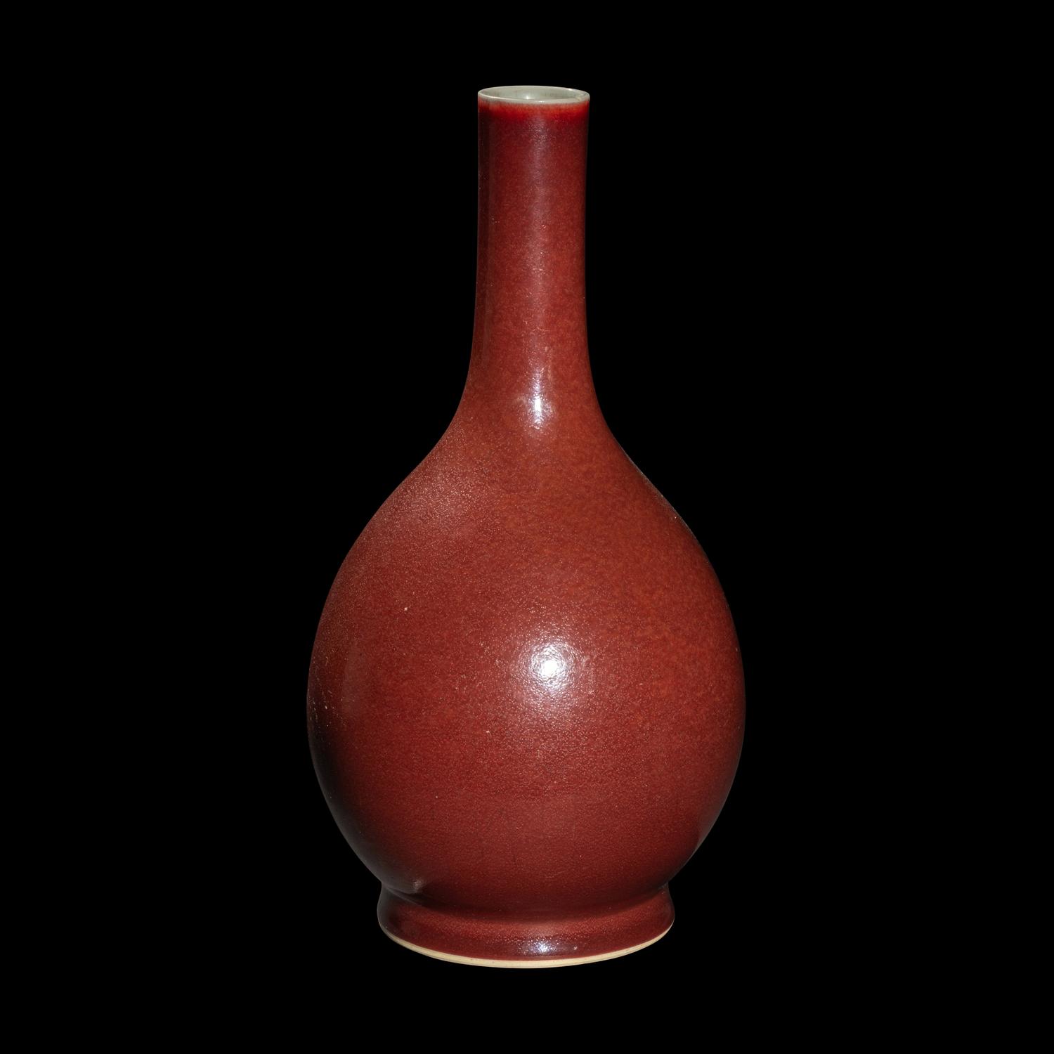 A Chinese Sang-de-Boeuf Glazed Porcelain Bottle Vase, 18th/19th Century 清中期 寶石紅釉賞瓶