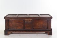 A German Carved and Paneled Walnut Kast