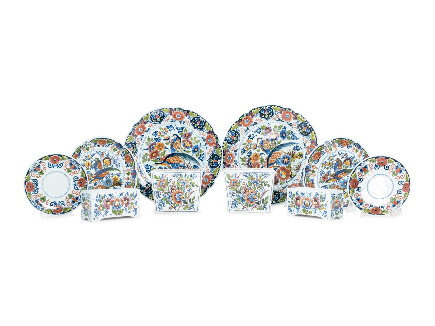 A Delft Polychrome Decorated Earthenware Dinner Service