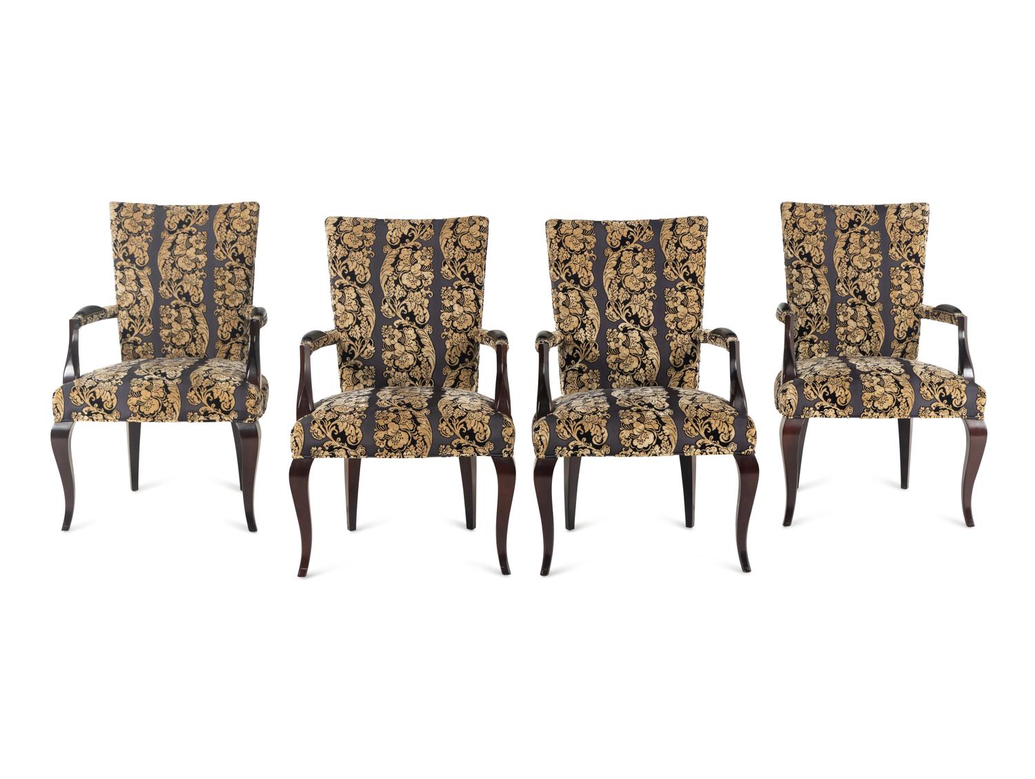 A Set of Four Upholstered Armchairs