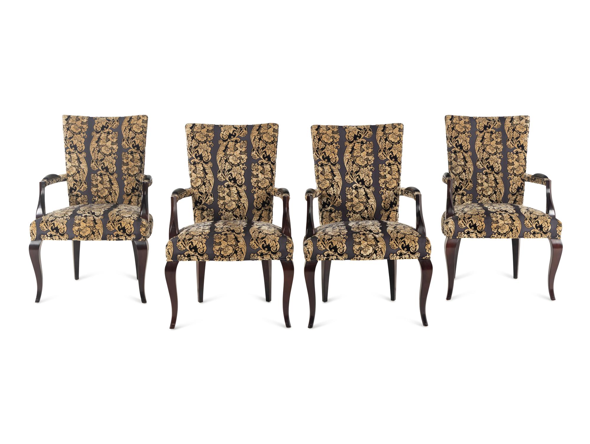 A Set of Four Upholstered Armchairs