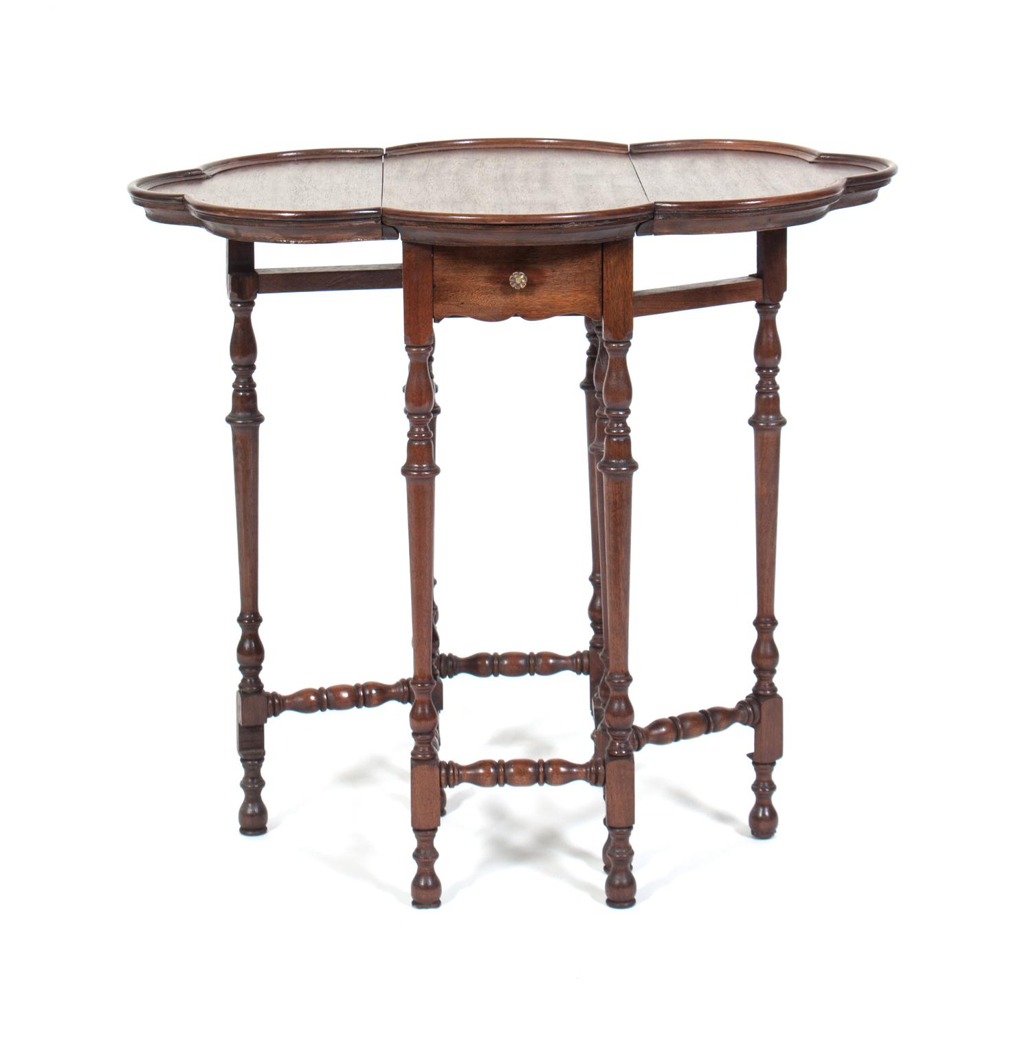 A Gate-Leg Table Height 24 3/4 inches.