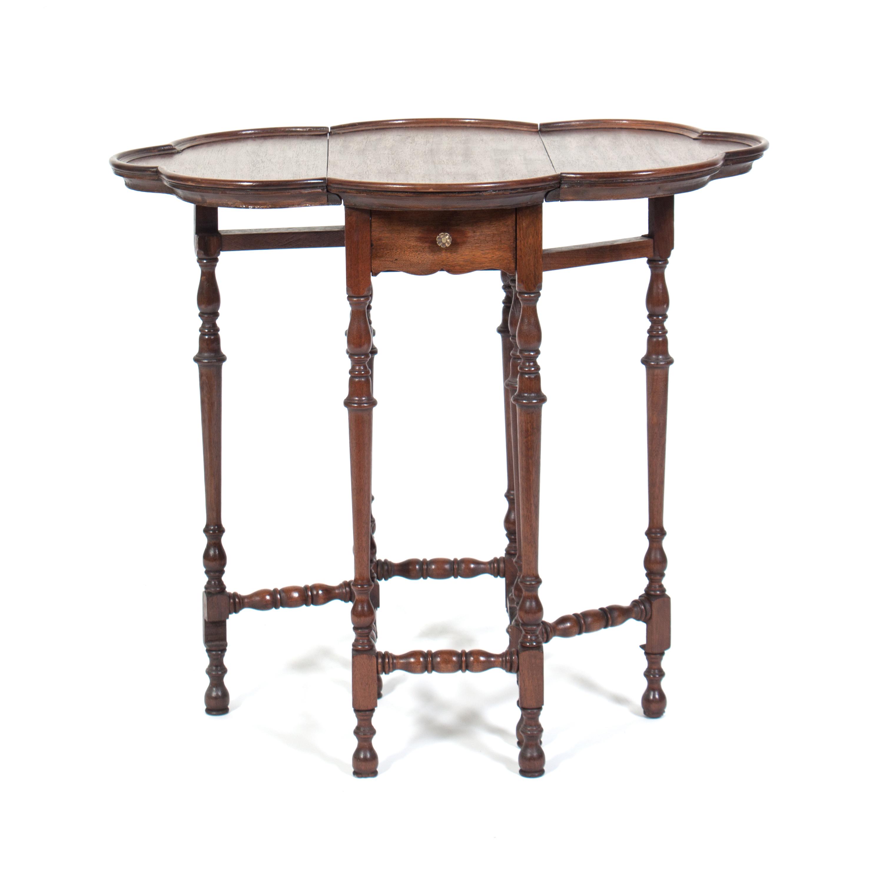 A Gate-Leg Table Height 24 3/4 inches.