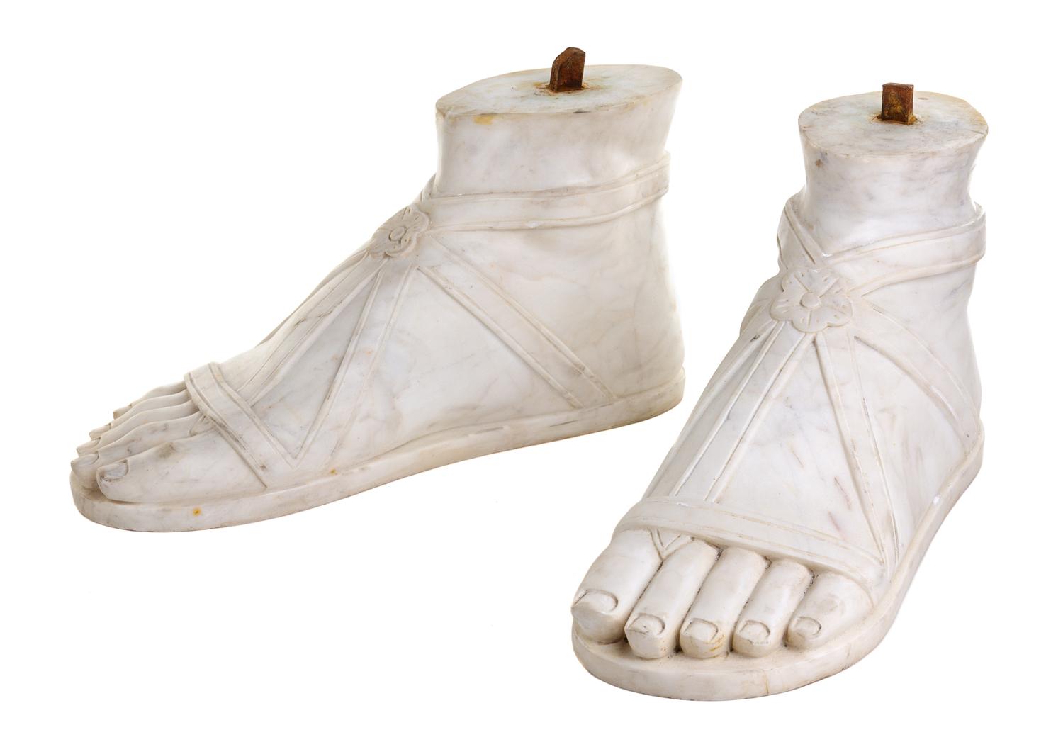 A Pair of Italian Carved Marble Feet Height 7 7/8 x width 5 1/2 x depth 15 1/4 inches. — AFTER THE ANTIQUE