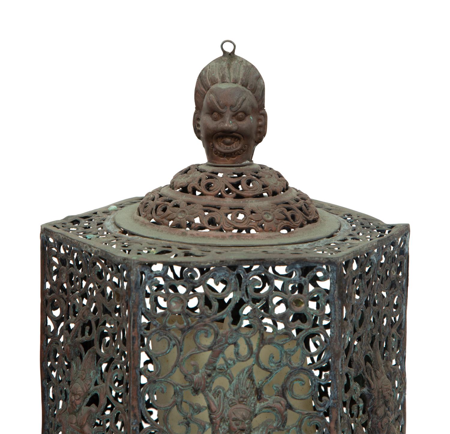 A Set of Three of Chinese Bronze Hanging Lanterns