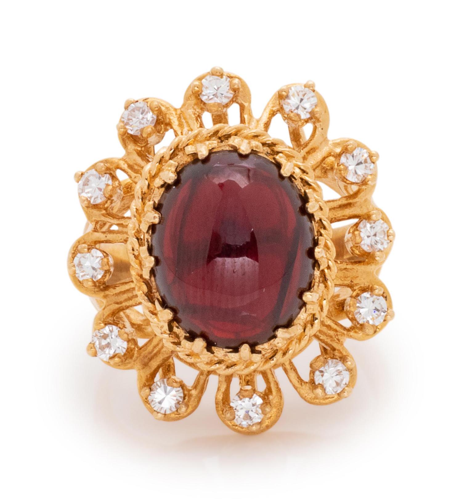 A 14 Karat Yellow Gold, Garnet and Diamond Ring,