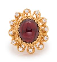 A 14 Karat Yellow Gold, Garnet and Diamond Ring,