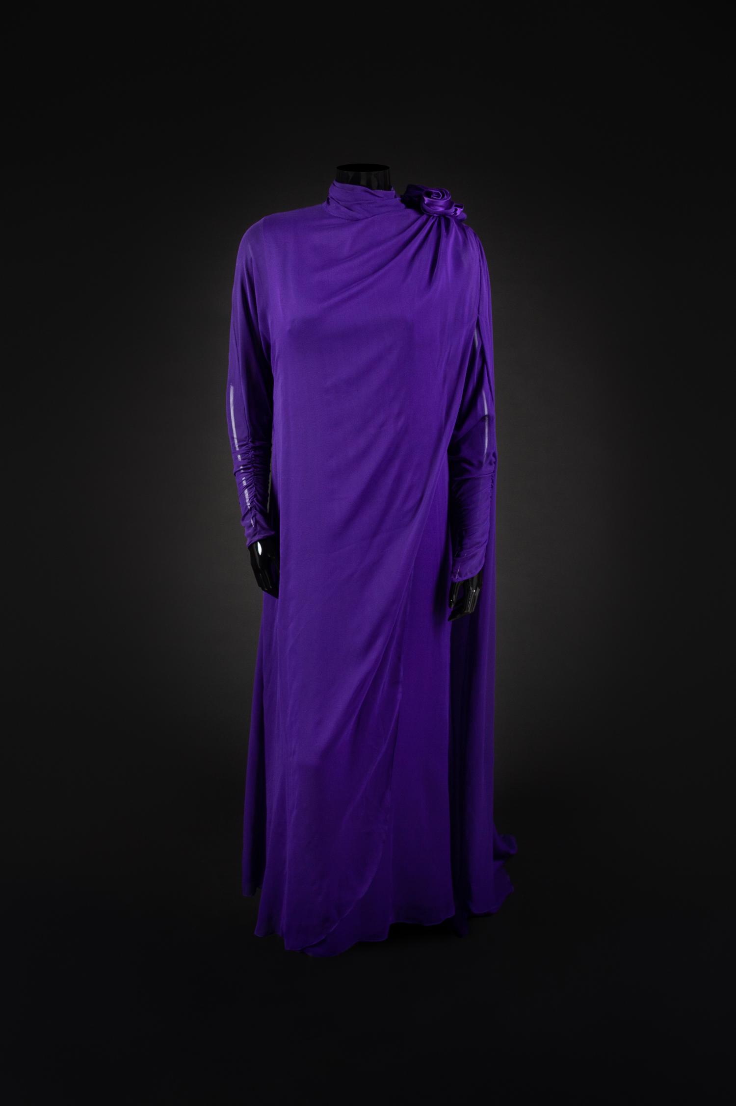 Dress, Earrings and Bag, 1987. Dress designed by Paul Zastupnevitch and made by Western Costume Company in Los Angeles — Worn by Olivia de Havilland at the Golden Globes Awards in 1987 to accept a Golden Globe Award for Best Supporting Actress in a Series, Mini Series or Motion Picture made for TV for her role in ‘Anastasia: The Mystery of Anna’.