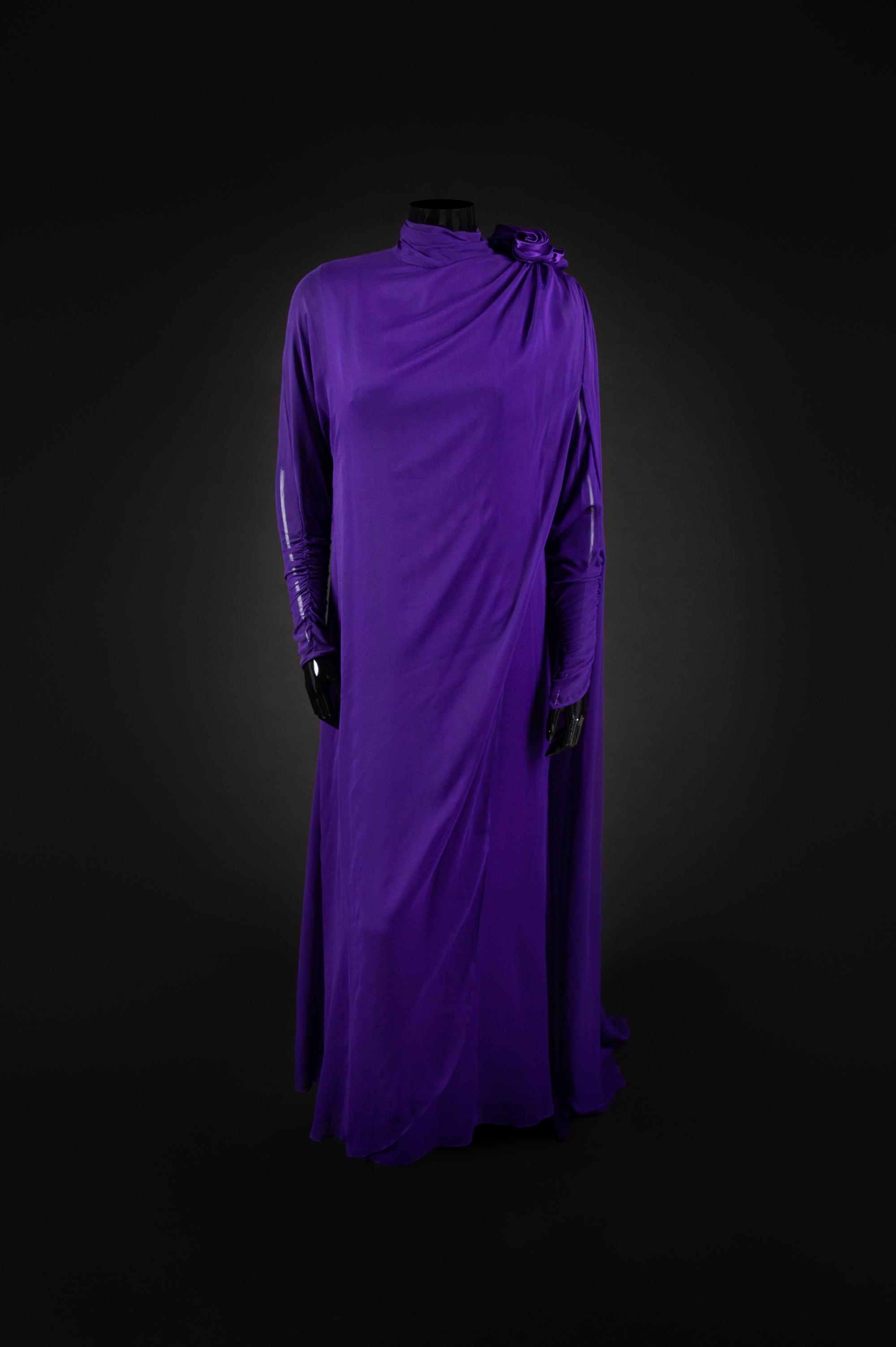 Dress, Earrings and Bag, 1987. Dress designed by Paul Zastupnevitch and made by Western Costume Company in Los Angeles — Worn by Olivia de Havilland at the Golden Globes Awards in 1987 to accept a Golden Globe Award for Best Supporting Actress in a Series, Mini Series or Motion Picture made for TV for her role in ‘Anastasia: The Mystery of Anna’.