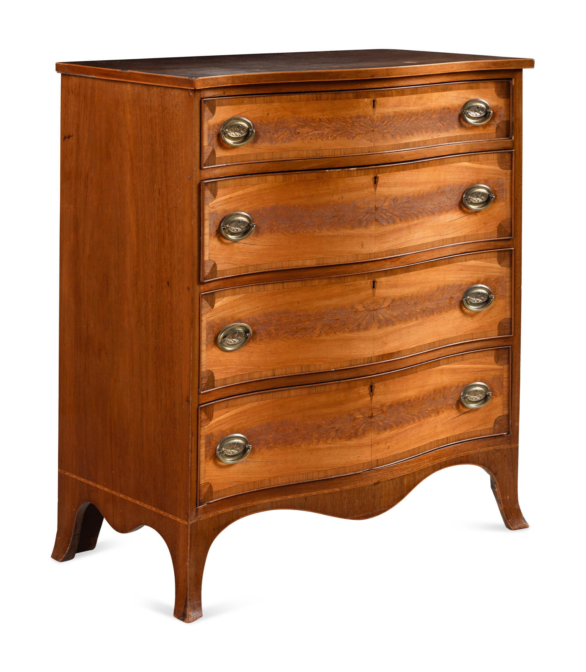A Federal Mahogany and Inlaid Serpentine-Front Chest of Drawers