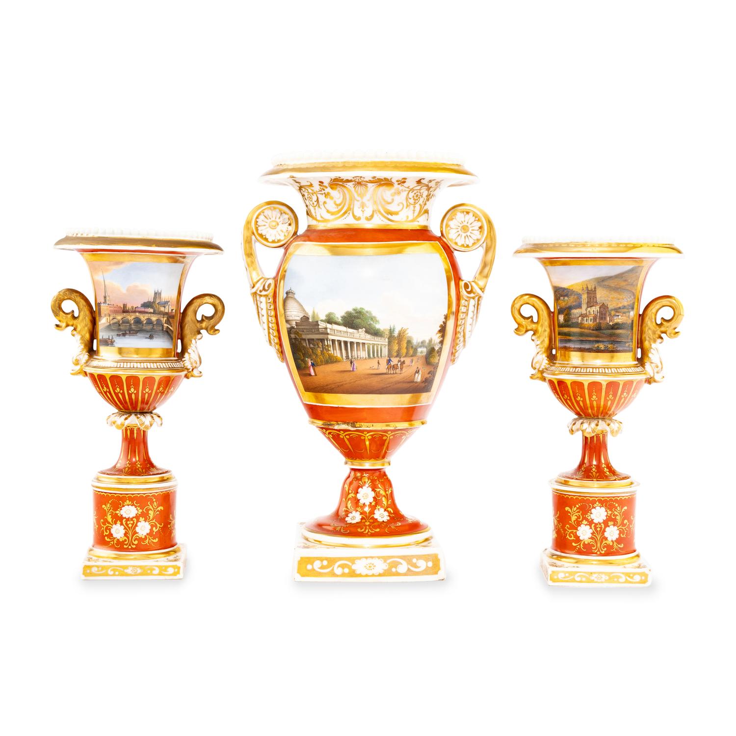 A Worcester Porcelain Hand Painted and Parcel Gilt Three-Piece Urn Garniture