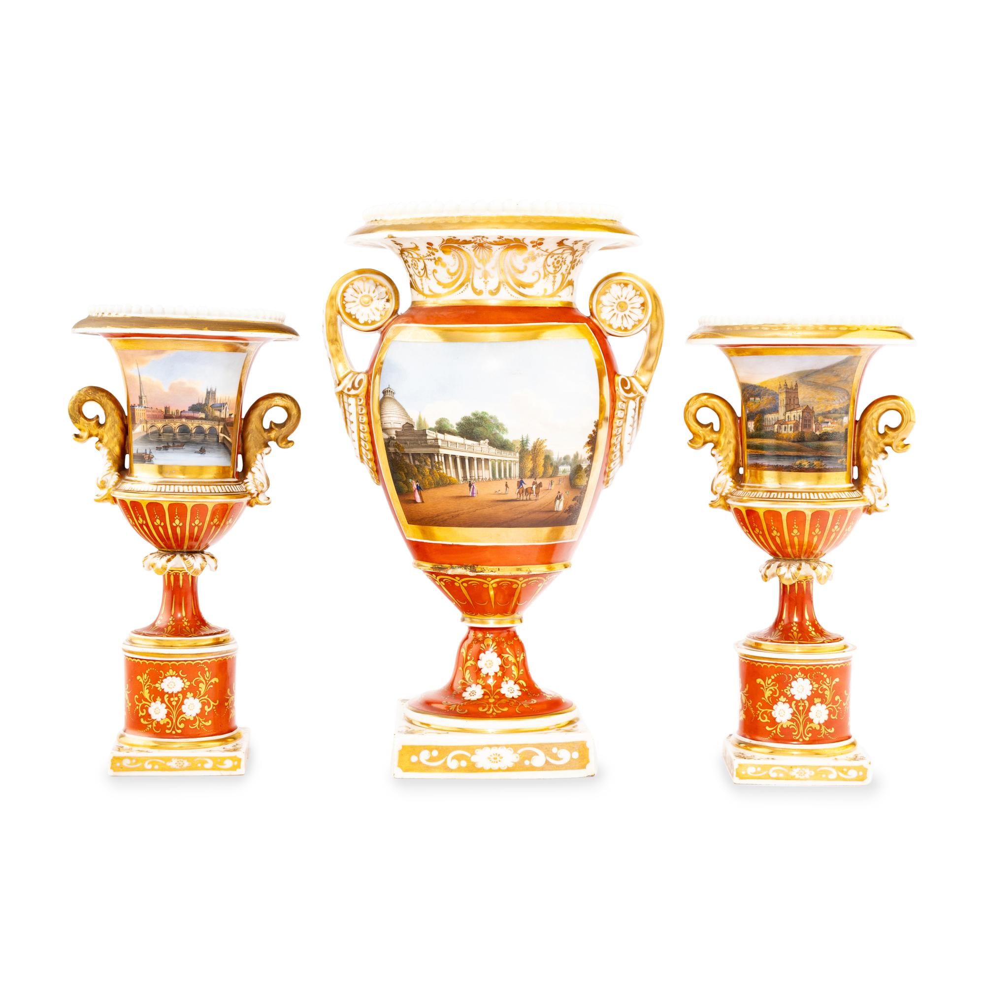 A Worcester Porcelain Hand Painted and Parcel Gilt Three-Piece Urn Garniture