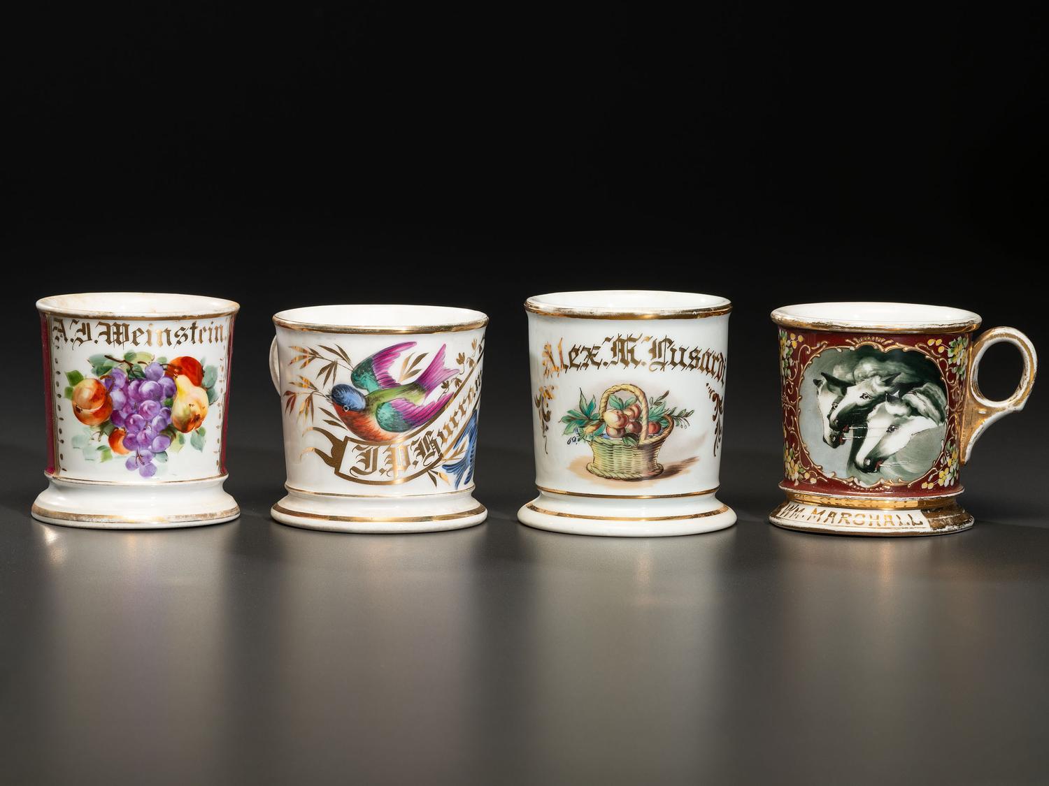 Four Porcelain Shaving Mugs with Fruit and Floral Decoration