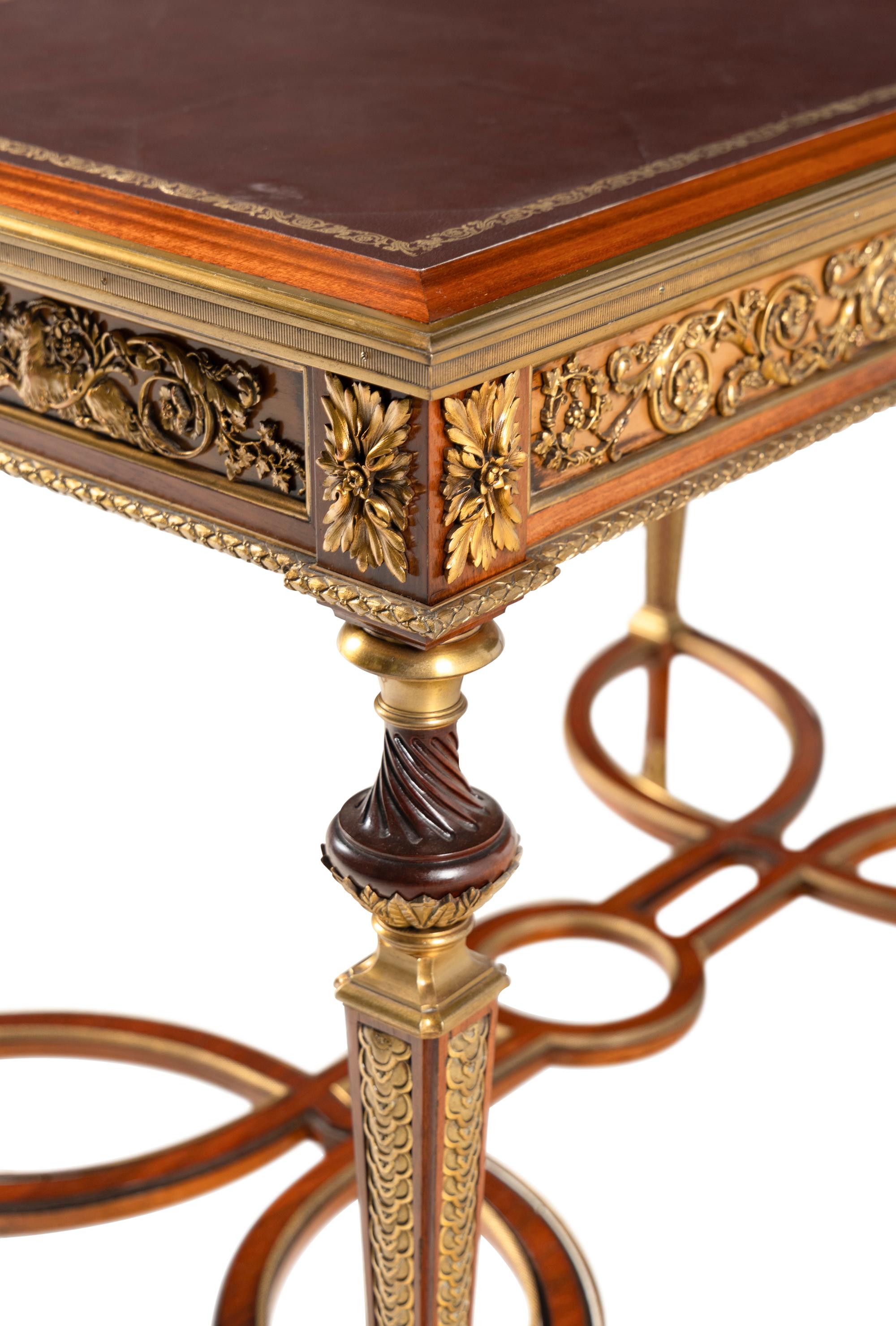A Louis XVI Style Gilt Bronze Mounted Mahogany Writing Table